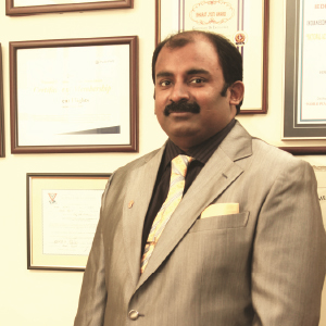 Dr. Anand Jacob Verghese,,CEO